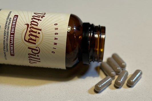 Vitality Pills organic chicken liver capsules in amber glass jar, whole-food iron supplement